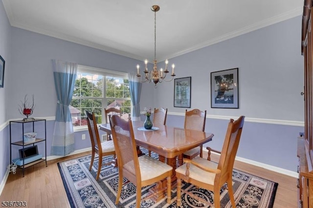 6 Bowers Dr, Allamuchy Twp, NJ 07840 - dining room with a chandelier, light wood-style flooring, and crown molding