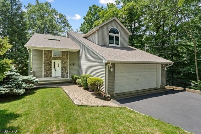 129 W Lake Shore Dr, Rockaway Twp, NJ 07866 - view of front of house with a shingled roof and a front lawn
