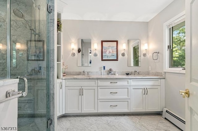 129 W Lake Shore Dr, Rockaway Twp, NJ 07866 - bathroom featuring a baseboard heating unit, double vanity, a shower stall, and marble look tile flooring