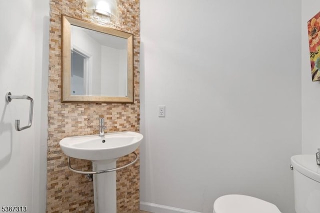 129 W Lake Shore Dr, Rockaway Twp, NJ 07866 - half bathroom with toilet and decorative backsplash