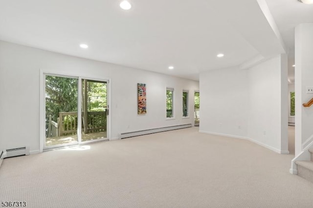 129 W Lake Shore Dr, Rockaway Twp, NJ 07866 - carpeted spare room featuring a baseboard radiator, recessed lighting, and stairs