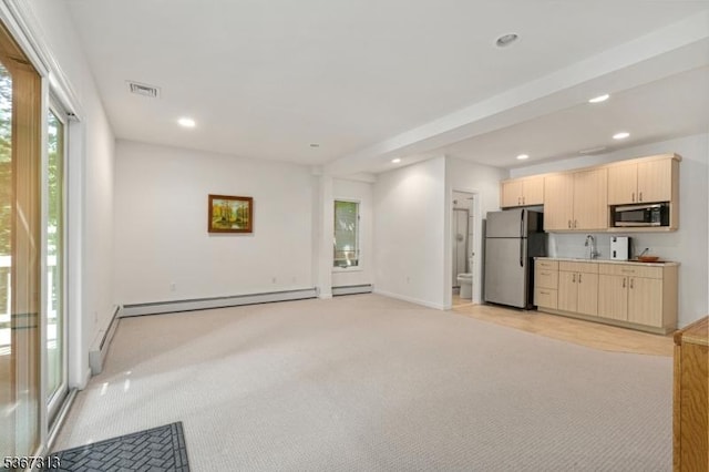 129 W Lake Shore Dr, Rockaway Twp, NJ 07866 - kitchen featuring freestanding refrigerator, light brown cabinets, recessed lighting, light carpet, and a baseboard radiator