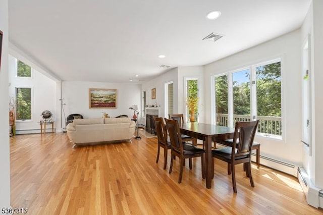 129 W Lake Shore Dr, Rockaway Twp, NJ 07866 - dining room featuring light wood-style flooring, recessed lighting, baseboard heating, and a baseboard radiator