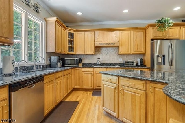 3 Mackenzie Ct, Sparta Twp, NJ 07871 - kitchen featuring stainless steel appliances, ornamental molding, light wood finished floors, glass insert cabinets, and backsplash