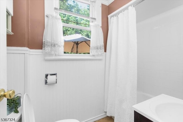 7 Park Ave, Summit City, NJ 07901 - bathroom with vanity, wainscoting, ornamental molding, and shower / bath combination with curtain