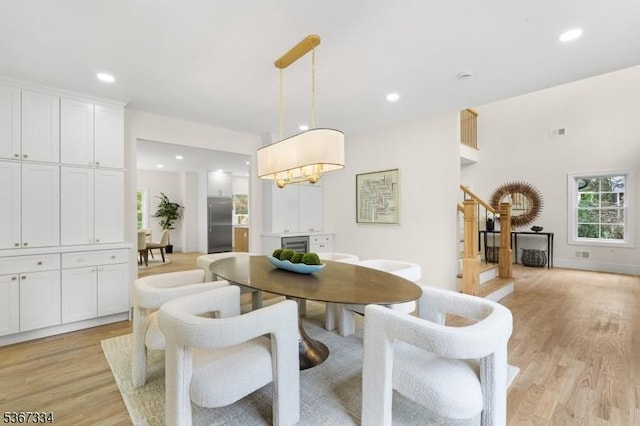 211 Spencer Rd, Bernards Twp, NJ 07920 - dining area featuring light wood-style flooring, stairway, and recessed lighting