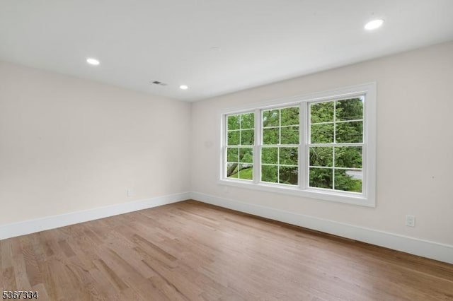 211 Spencer Rd, Bernards Twp, NJ 07920 - empty room featuring wood finished floors and recessed lighting