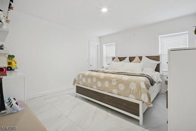 28 Sanford Ave, Belleville Twp, NJ 07109 - bedroom with marble look tile flooring and baseboards