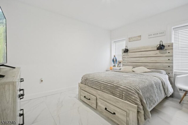 28 Sanford Ave, Belleville Twp, NJ 07109 - bedroom featuring light marble finish floors and baseboards
