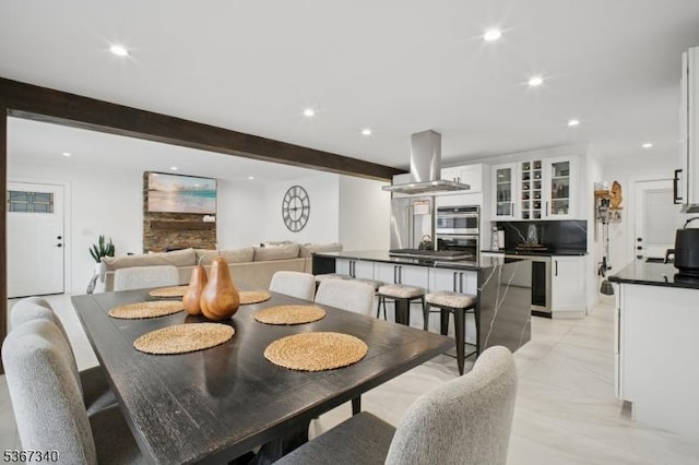 28 Sanford Ave, Belleville Twp, NJ 07109 - dining space with recessed lighting, beam ceiling, and wine cooler