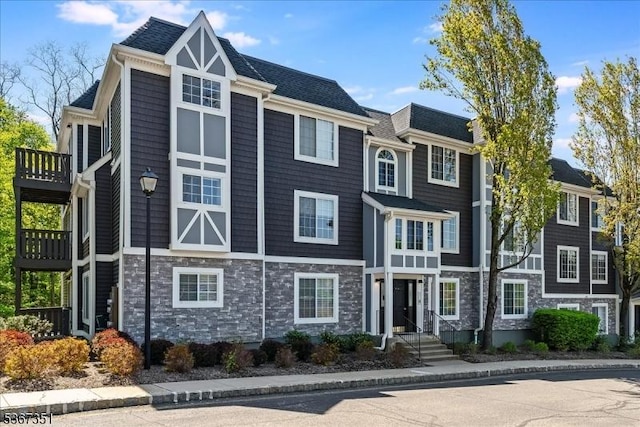81 Village Dr Unit 81, Morris Twp, NJ 07960 - view of front of property with stone siding and a balcony
