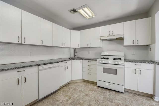 81 Village Dr Unit 81, Morris Twp, NJ 07960 - kitchen featuring white appliances, under cabinet range hood, white cabinets, tasteful backsplash, and dark stone countertops