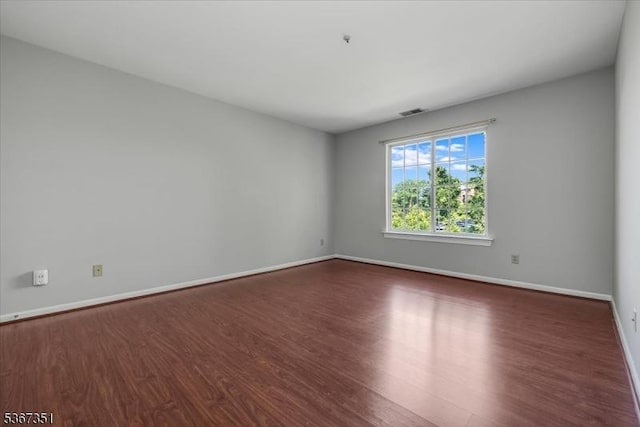 81 Village Dr Unit 81, Morris Twp, NJ 07960 - unfurnished room featuring wood finished floors and baseboards