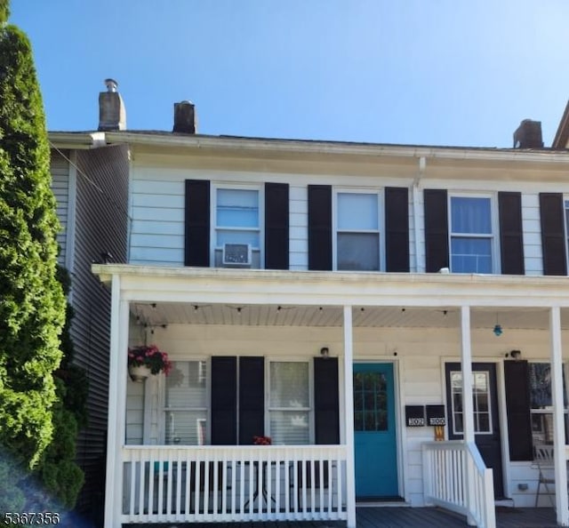 302 Chambers St, Phillipsburg Town, NJ 08865 - view of front of home featuring covered porch and a chimney