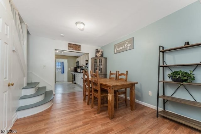 302 Chambers St, Phillipsburg Town, NJ 08865 - dining space featuring light wood-style flooring and stairs