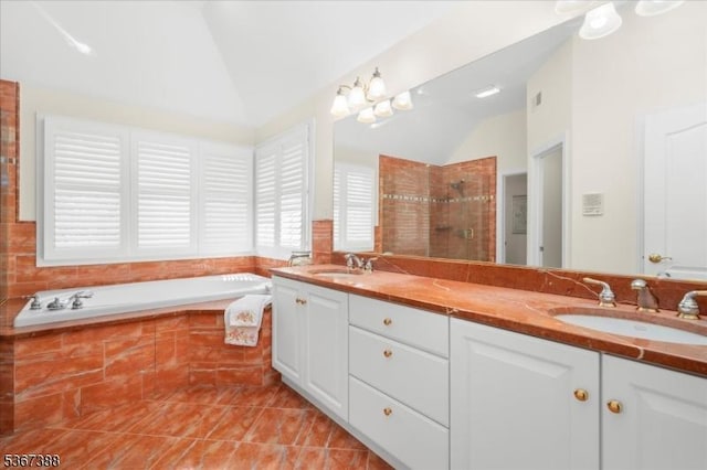 3 Stanbury Ln, Kingwood Twp, NJ 08825 - bathroom with vaulted ceiling, double vanity, a tile shower, a bath, and tile patterned floors