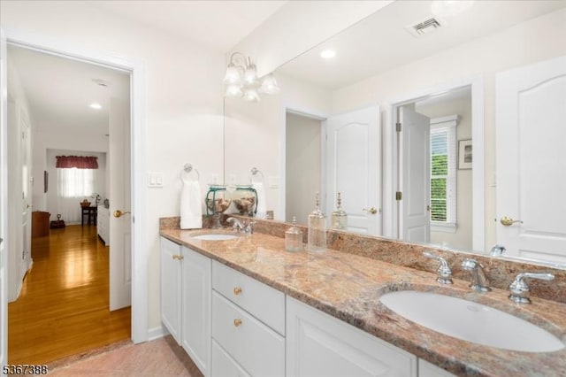 3 Stanbury Ln, Kingwood Twp, NJ 08825 - bathroom featuring double vanity and wood finished floors