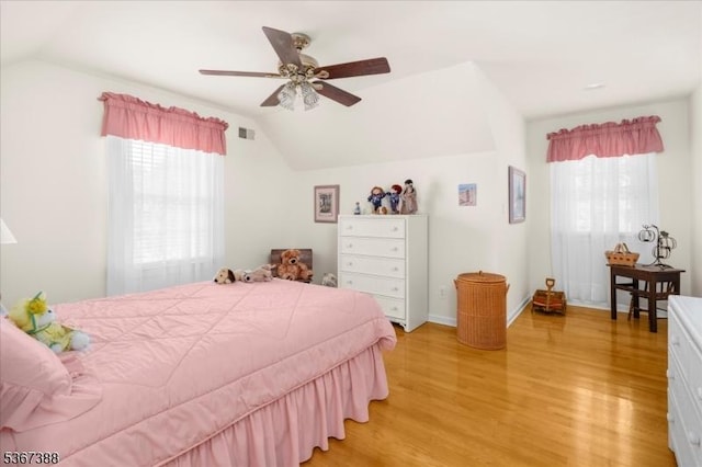 3 Stanbury Ln, Kingwood Twp, NJ 08825 - bedroom featuring vaulted ceiling, multiple windows, light wood-style floors, and a ceiling fan