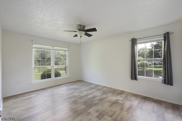 136 Woodward Ln, Bernards Twp, NJ 07920 - empty room featuring wood finished floors, ceiling fan, and a textured ceiling