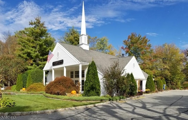 29F Concord Rd Unit F, West Milford Twp, NJ 07480 - view of home's exterior featuring a lawn and a chimney