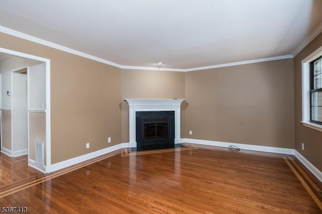 29F Concord Rd Unit F, West Milford Twp, NJ 07480 - unfurnished living room featuring wood finished floors, crown molding, and a fireplace with flush hearth