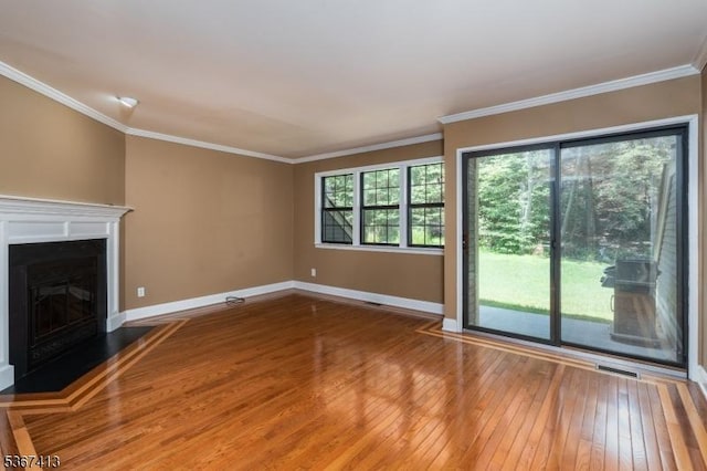 29F Concord Rd Unit F, West Milford Twp, NJ 07480 - unfurnished living room featuring hardwood / wood-style floors, a fireplace with raised hearth, and crown molding