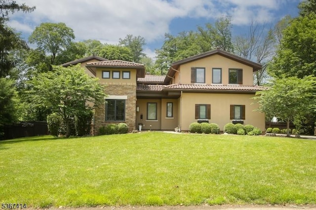 39 Crescent Dr, Morris Twp, NJ 07960 - view of front facade with stucco siding, a front yard, and a tiled roof