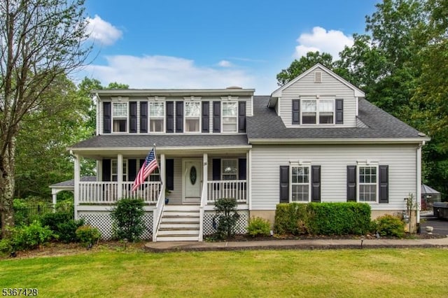 14 Windjammer Dr, Jefferson Twp, NJ 07849 - view of front facade with a front lawn, covered porch, and a shingled roof