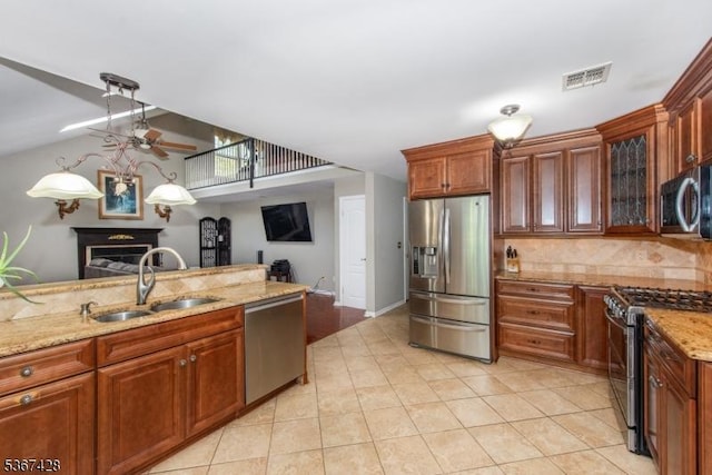 14 Windjammer Dr, Jefferson Twp, NJ 07849 - kitchen featuring stainless steel appliances, backsplash, ceiling fan, light stone counters, and light tile patterned floors