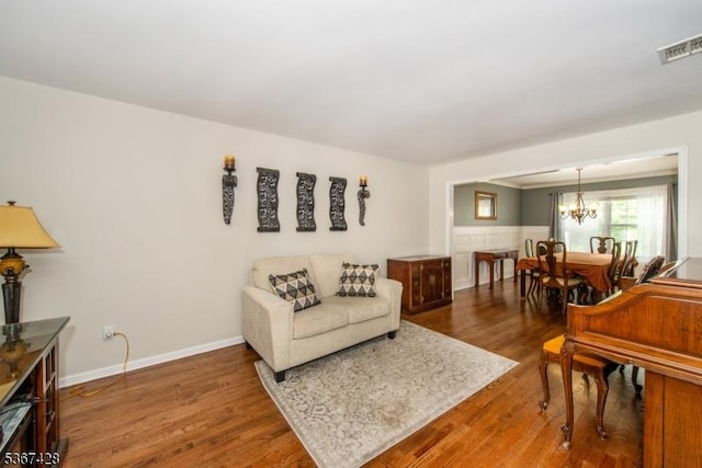 14 Windjammer Dr, Jefferson Twp, NJ 07849 - living room with a chandelier and wood finished floors
