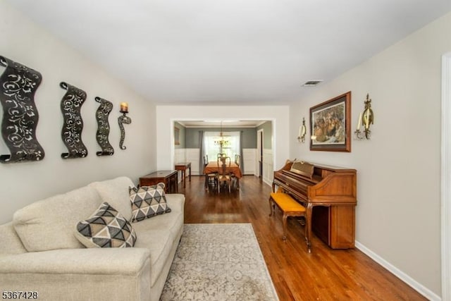 14 Windjammer Dr, Jefferson Twp, NJ 07849 - living room featuring wood finished floors and a chandelier