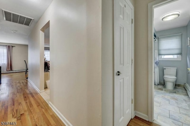 830 Pennsylvania Ave, Lyndhurst Twp, NJ 07071 - corridor with healthy amount of natural light and light wood finished floors