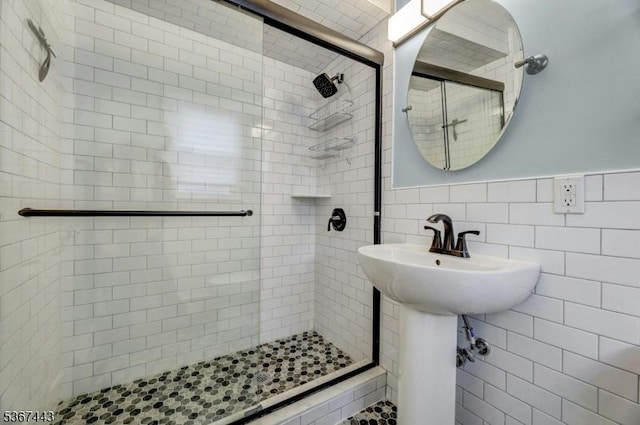 830 Pennsylvania Ave, Lyndhurst Twp, NJ 07071 - bathroom with a stall shower, tile walls, and wainscoting