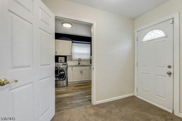 830 Pennsylvania Ave, Lyndhurst Twp, NJ 07071 - carpeted entryway with washer / dryer and a sink