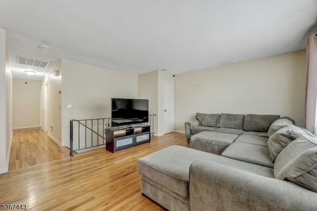 830 Pennsylvania Ave, Lyndhurst Twp, NJ 07071 - living room featuring light wood-style flooring and baseboards