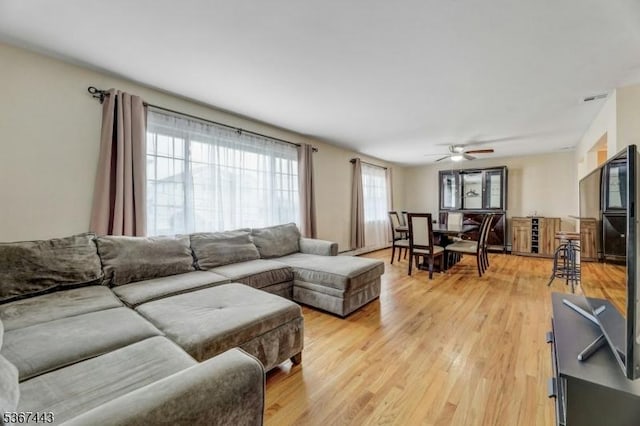 830 Pennsylvania Ave, Lyndhurst Twp, NJ 07071 - living area featuring light wood finished floors and ceiling fan