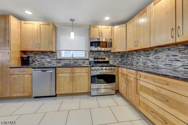 830 Pennsylvania Ave, Lyndhurst Twp, NJ 07071 - kitchen with stainless steel appliances, backsplash, light brown cabinetry, dark stone counters, and recessed lighting