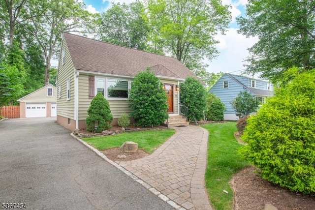 88 Overlook Ave, East Hanover Twp, NJ 07936 - view of front of home with an outdoor structure, a garage, roof with shingles, and a front lawn