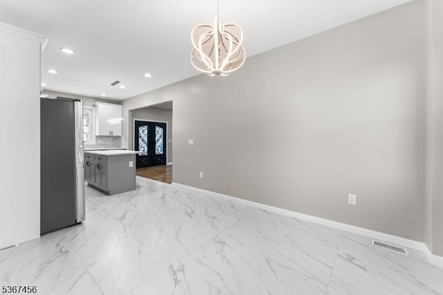 331 W Ln, Clark Twp, NJ 07066 - kitchen with freestanding refrigerator, light marble finish floors, recessed lighting, a chandelier, and light countertops