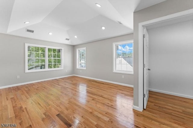 331 W Ln, Clark Twp, NJ 07066 - unfurnished bedroom featuring multiple windows, lofted ceiling, light wood finished floors, and recessed lighting