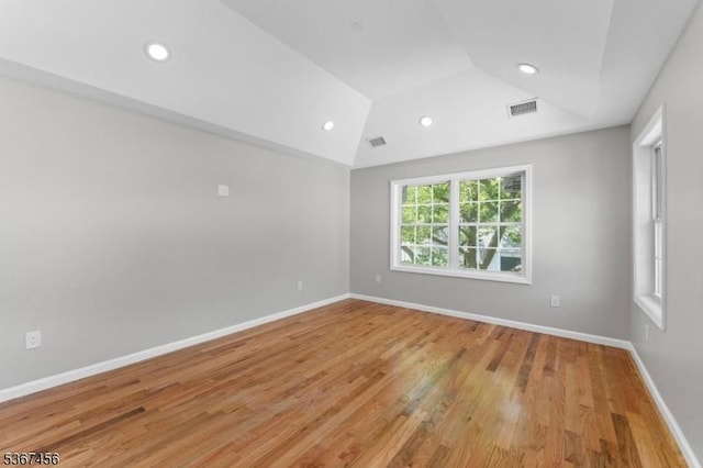 331 W Ln, Clark Twp, NJ 07066 - unfurnished room with lofted ceiling, light wood-style flooring, and recessed lighting