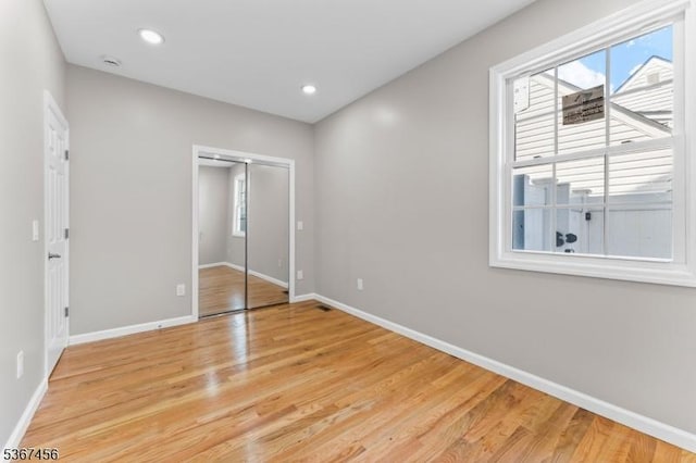 331 W Ln, Clark Twp, NJ 07066 - unfurnished bedroom with light wood-type flooring, a closet, and recessed lighting