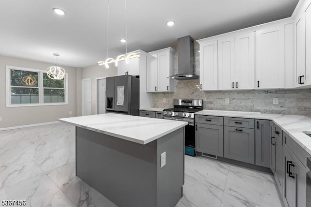 331 W Ln, Clark Twp, NJ 07066 - kitchen with wall chimney exhaust hood, fridge with ice dispenser, gas range, light marble finish floors, and recessed lighting