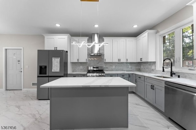 331 W Ln, Clark Twp, NJ 07066 - kitchen with appliances with stainless steel finishes, wall chimney range hood, light marble finish floors, a center island, and recessed lighting