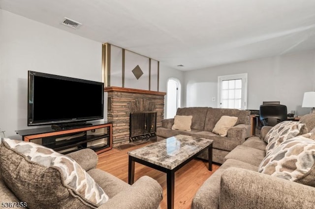 917 Tompkins Ave, South Plainfield Boro, NJ 07080 - living room featuring wood finished floors and a fireplace
