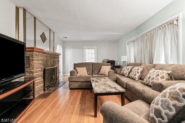 917 Tompkins Ave, South Plainfield Boro, NJ 07080 - living area featuring light wood finished floors and a fireplace