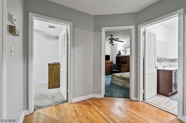 917 Tompkins Ave, South Plainfield Boro, NJ 07080 - corridor featuring an office area and light wood finished floors