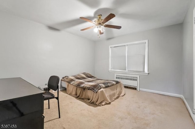 917 Tompkins Ave, South Plainfield Boro, NJ 07080 - bedroom with radiator heating unit, carpet flooring, an office area, and a ceiling fan
