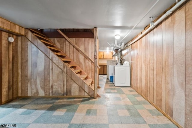 917 Tompkins Ave, South Plainfield Boro, NJ 07080 - finished basement featuring tile patterned floors, wooden walls, washer and dryer, and stairway