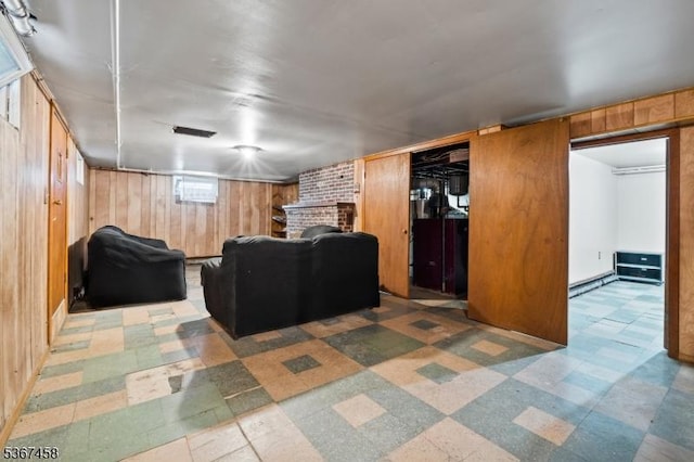 917 Tompkins Ave, South Plainfield Boro, NJ 07080 - living area with wood walls, tile patterned floors, and a fireplace